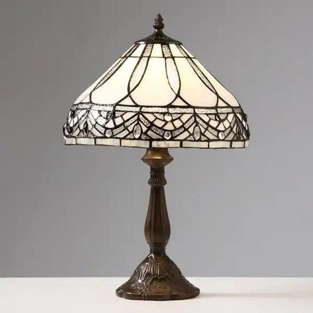 Tiffany-Inspired White Jewels Table Lamp: Tiffany-Inspired White Jewels Table Lamp This elegant Tiffany-style table lamp is crafted from 234 hand-cut stained glass pieces, each wrapped in copper foil to create its warm white and brown mosaic 