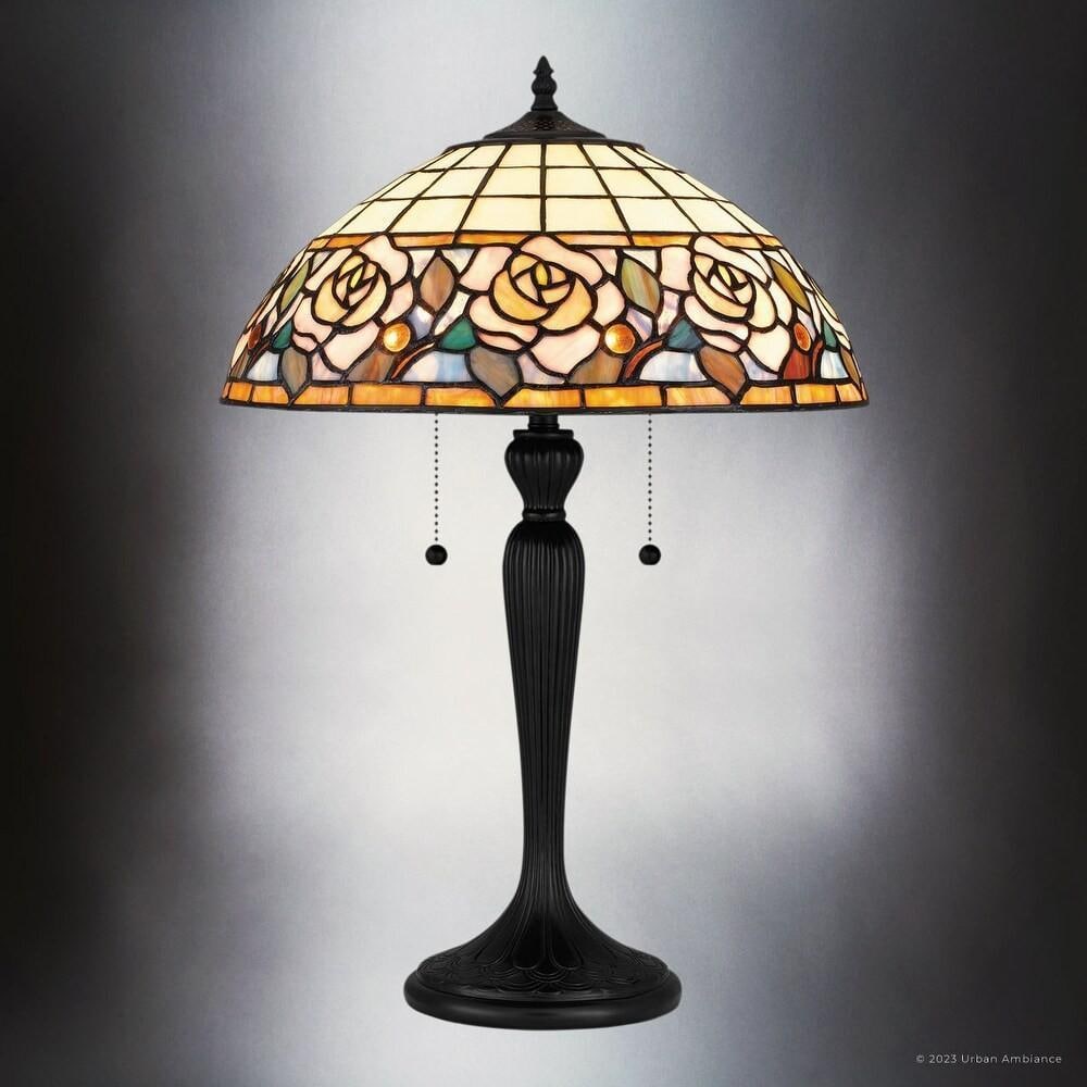 Tiffany-Style Rose Motif Stained Glass Table Lamp: Tiffany-Style Rose Motif Stained Glass Table Lamp This Tiffany-inspired table lamp features a dome-shaped stained glass shade crafted in rich honey amber, cream, green, blue, and yellow hues, arranged