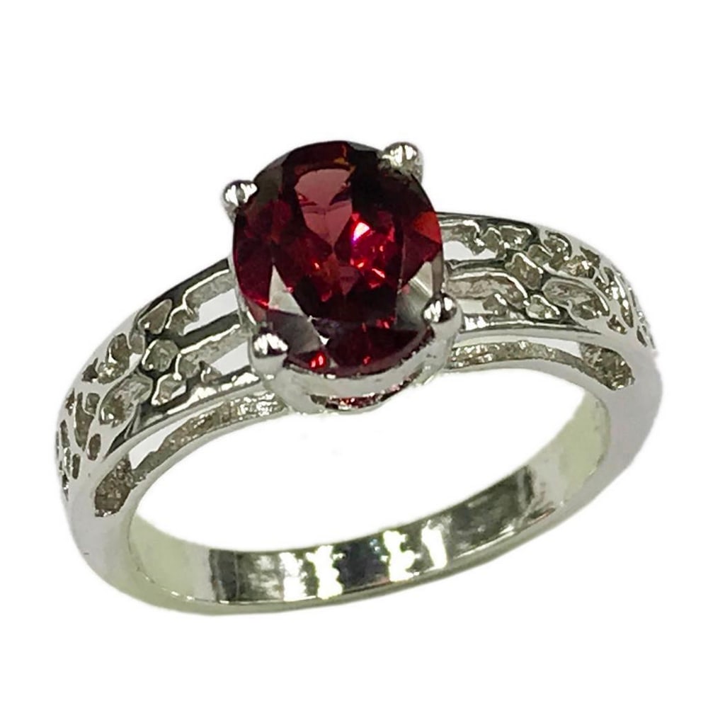 Zirconia and Red Garnet Studded Sterling Silver Ring: Zirconia and Red Garnet Studded Sterling Silver Ring Inner Diameter: 18mm View Photos For Further Details