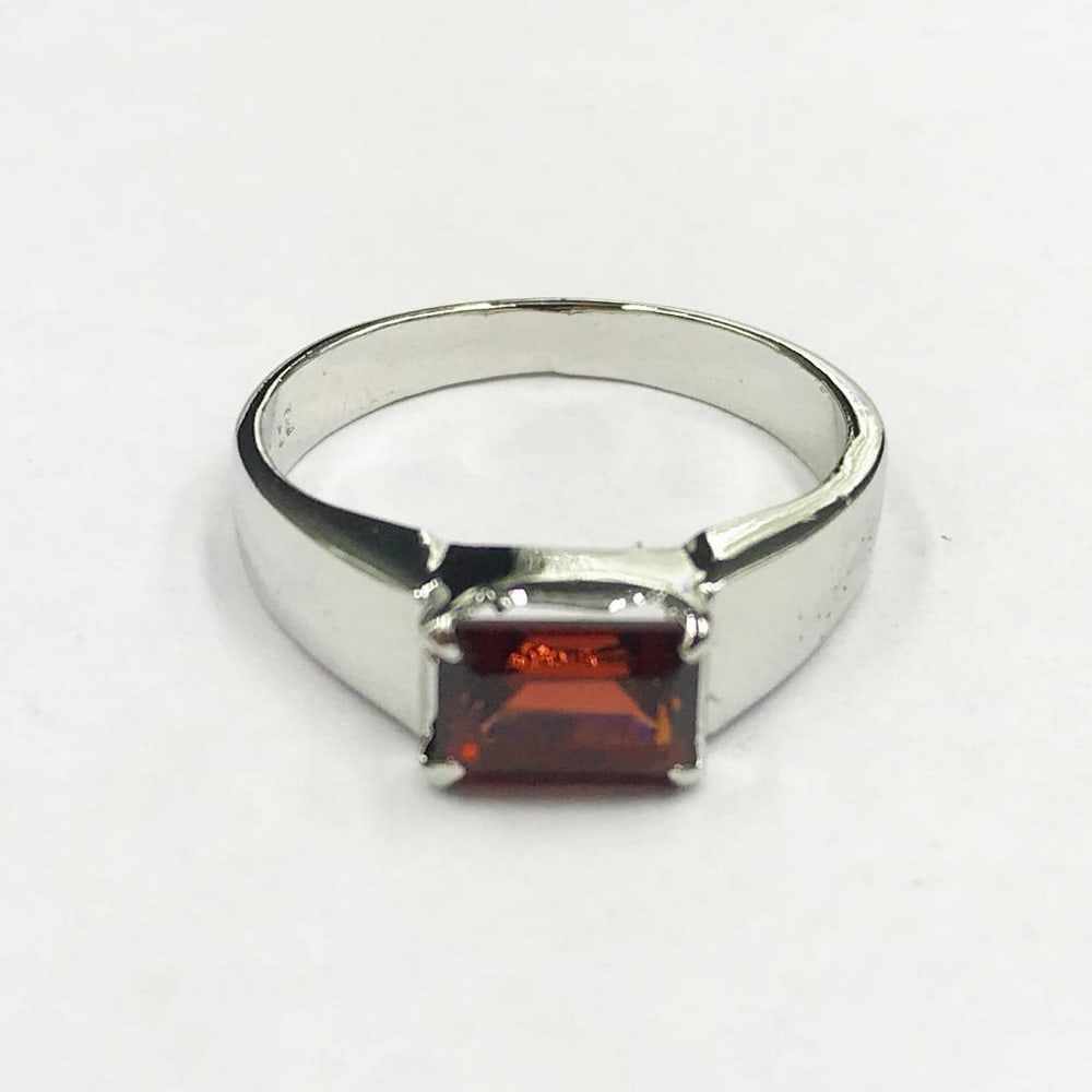 Simple Elegant Sterling Silver Ring Set with Garnet Octagon Gemstone - Size 7.5: Simple Elegant Sterling Silver Ring Set with Garnet Octagon Gemstone Introducing our Simple Elegant Sterling Silver Ring, a refined piece that effortlessly combines understated charm with timeless bea