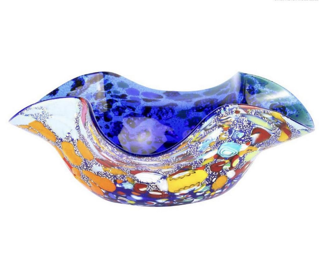 Multicolor Murano Glass Bell Bowl: Multicolor Murano Glass Bell Bowl A stunning piece of art characterized by its vibrant and varied colors, including shades of blue, white, and other hues. The bowl has an irregular, bell-like shape wi