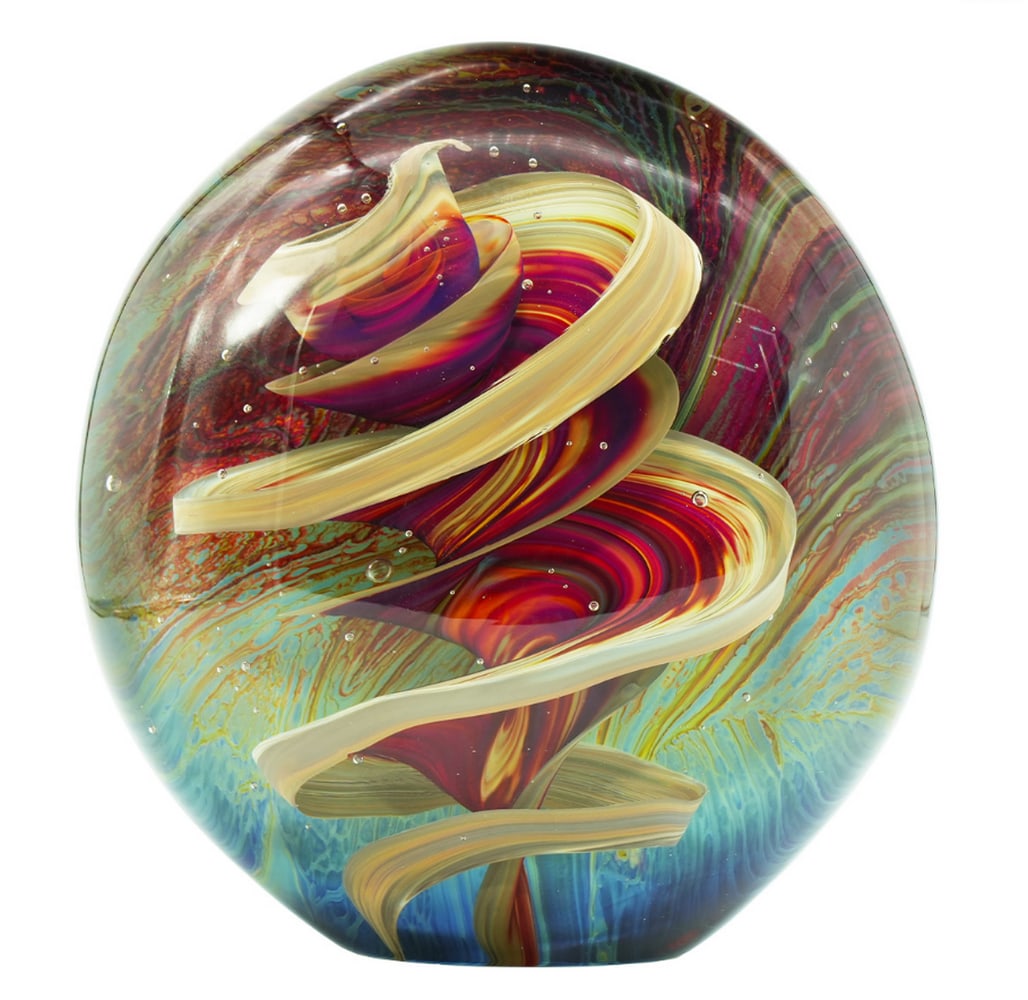 The Storm – Chalcedony Glass – Murano Glass: The Storm – Chalcedony Glass – Murano Glass This clear and chalcedony glass artwork takes the form of an egg, meticulously crafted freehand on a punty in solid glass. It is ground and polished by