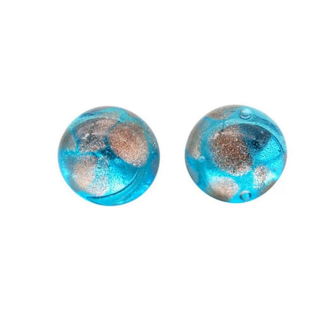 Delicate Light Blue Venetian Glass Earrings: Delicate Light Blue Venetian Glass Earrings Earrings handcrafted with aventurine glass accents, adding elegance and a touch of luxury. Featuring stunning colors and rich textures, all sealed beneath