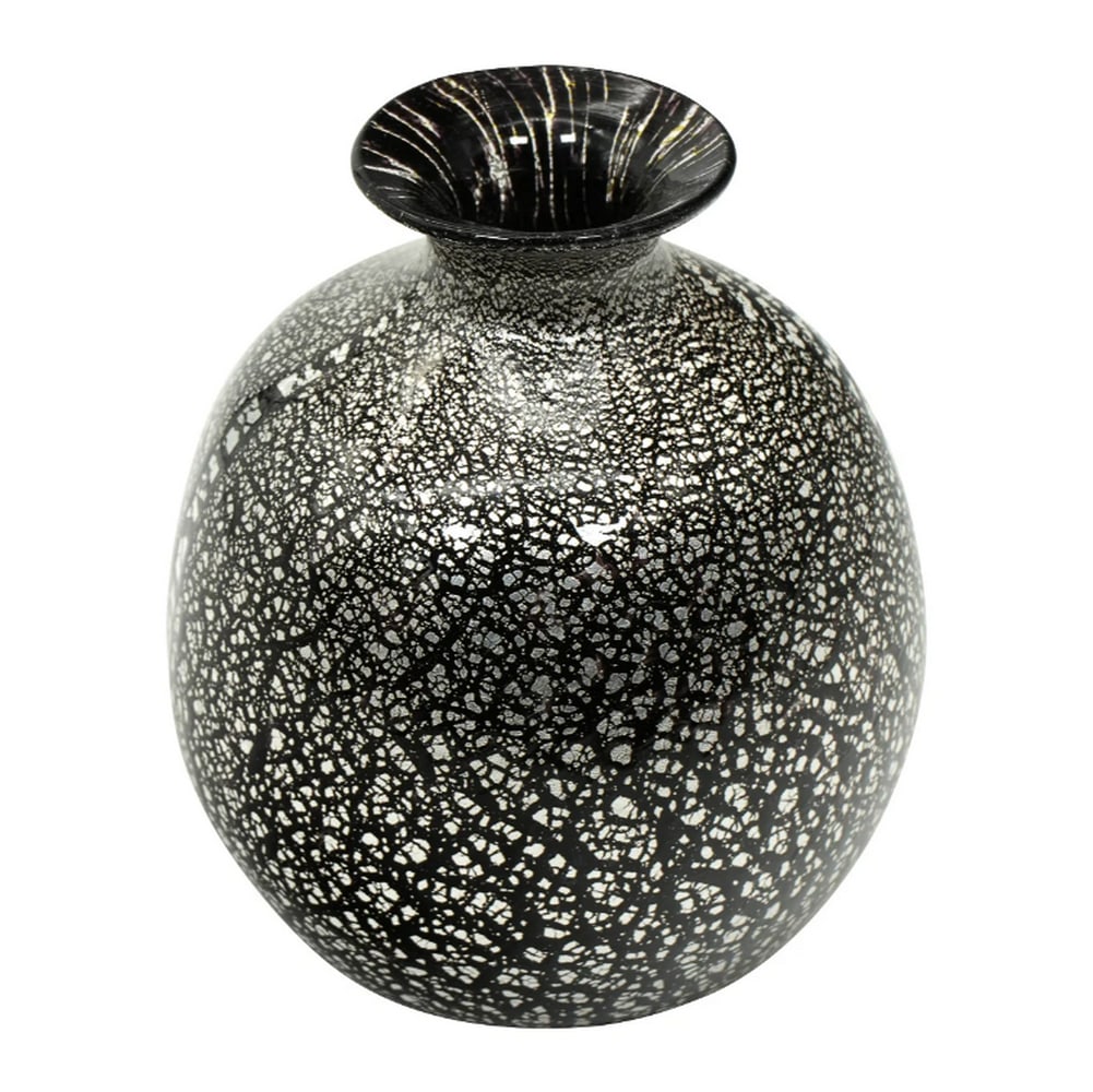Black Vase with Silver Leaf Decoration: Black Vase with Silver Leaf Decoration This vase is crafted using the traditional blown glass technique and enhanced with silver leaf decoration, skillfully worked and hand-blown. It is one of the mos