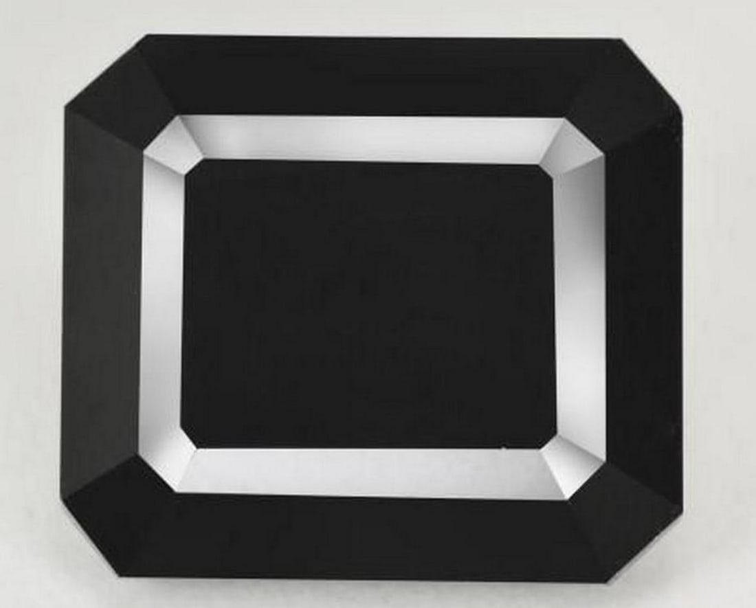 26.3ct Octagon Step Cut Infinite Loose Black Tourmaline Gemstone: 26.3ct Octagon Step Cut Infinite Loose Black Tourmaline Gemstone Introducing our exquisite 26.3ct Octagon Step Cut Infinite Loose Black Tourmaline Gemstone, a true marvel of nature's artistry. Cra