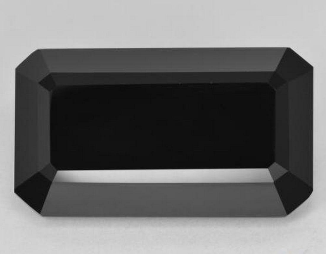 26.5ct Octagon Step Cut Schorl Black Loose Tourmaline Gemstone: 26.5ct Octagon Step Cut Schorl Black Loose Tourmaline Gemstone Presenting the 26.5ct Octagon Step Cut Schorl Black Loose Tourmaline Gemstone, a striking embodiment of elegance and sophistication. With