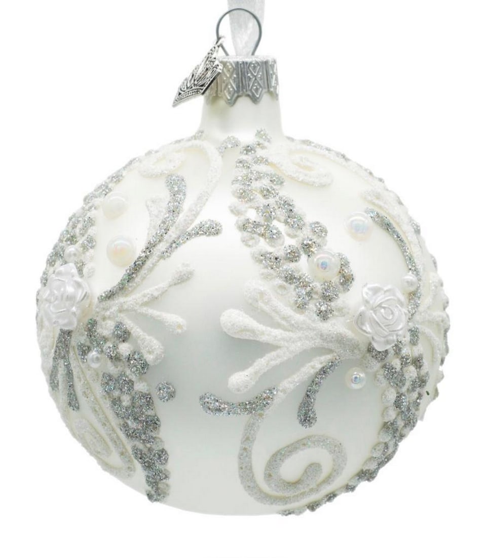 Sparkling Swirls and White Roses on a White Glass Ball Ornament: Sparkling Swirls and White Roses on a White Glass Ball Ornament Introducing our enchanting White Glass Christmas Ornament with Sparkling Swirls and White Roses - a timeless addition to your holiday