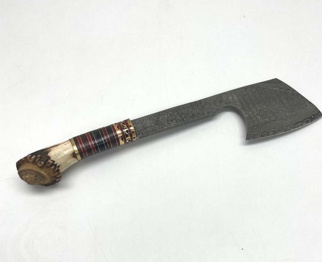 16" Damascus Axe Hand Carved Antler Hunters Handle: 16" Damascus Axe Hand Carved Antler Hunters Handle. Each blade is created Using 256 Layers Of 1095 and 15N20 High Carbon Steels?????? To Produce A Superior Edge And Maintain A High Tensile Strengt