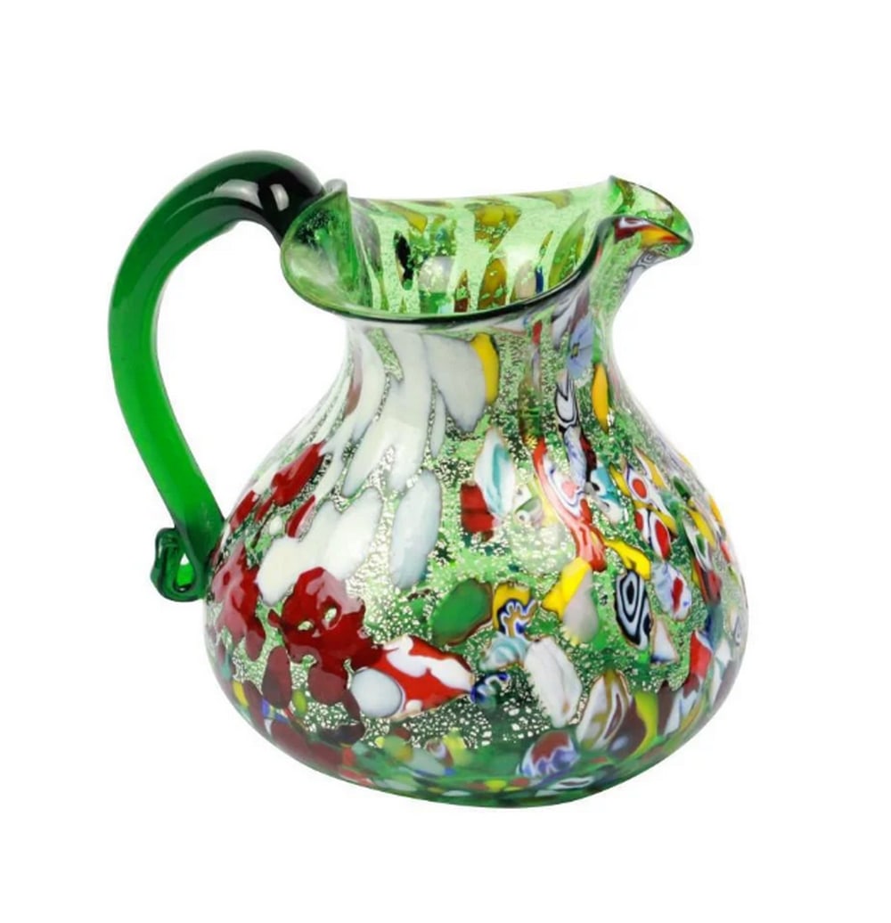 Murano Blown Green Glass Mix Colors Pitcher: Murano Blown Green Glass Mix Colors Pitcher This carafe is expertly crafted using glassblowing techniques and adorned with murrina decorations, signed by Master I. Rossi. Dimensions Length: 12 cm (inc