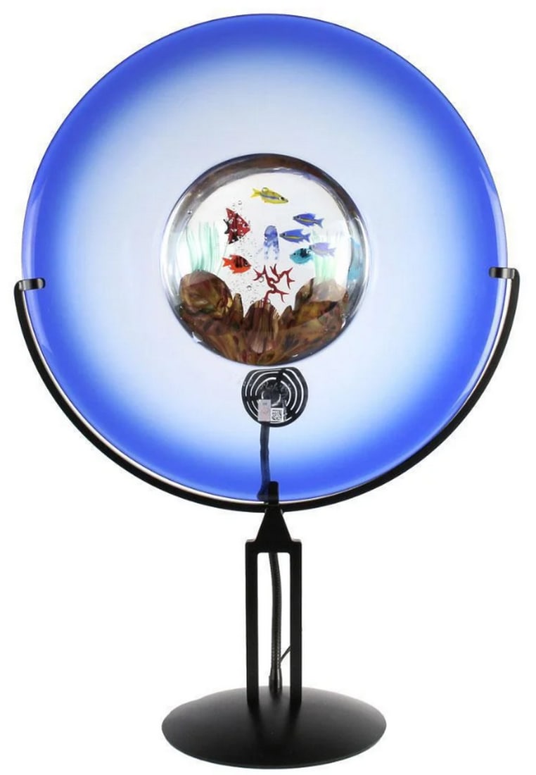 Murano Glass Aquarium Disc Table Lamp: Murano Glass Aquarium Disc Table Lamp This stunning disc table lamp is handcrafted using the submerged glass technique, showcasing an intricate production process. The adjustable light on the backside