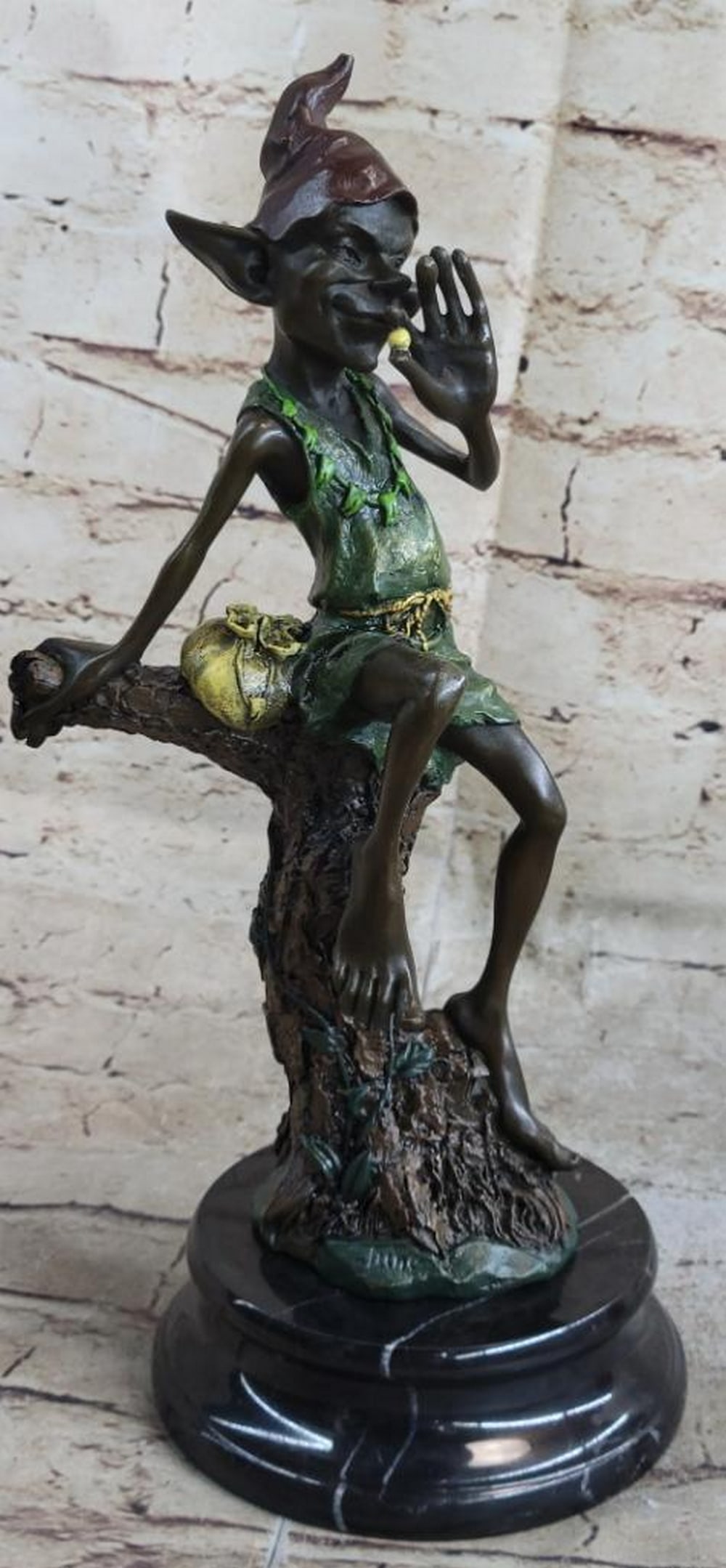 Mischievous Leprechaun with Pot of Gold Bronze Sculpture by Juno - 12" x 5": Mischievous Leprechaun with Pot of Gold Bronze Sculpture by Juno - 12" x 5" A whimsical masterpiece, this bronze sculpture by Juno captures a devilish leprechaun fiercely guarding his treasure