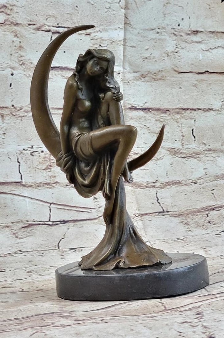 Women Sitting on Crescent Moon Inspired Bronze Statue - 9" x 5.5": Women Sitting on Crescent Moon Inspired Bronze Statue - 9" x 5.5" This stunning bronze sculpture captures a woman in a moment of intense passion, crafted with intricate detail. Seated upright 