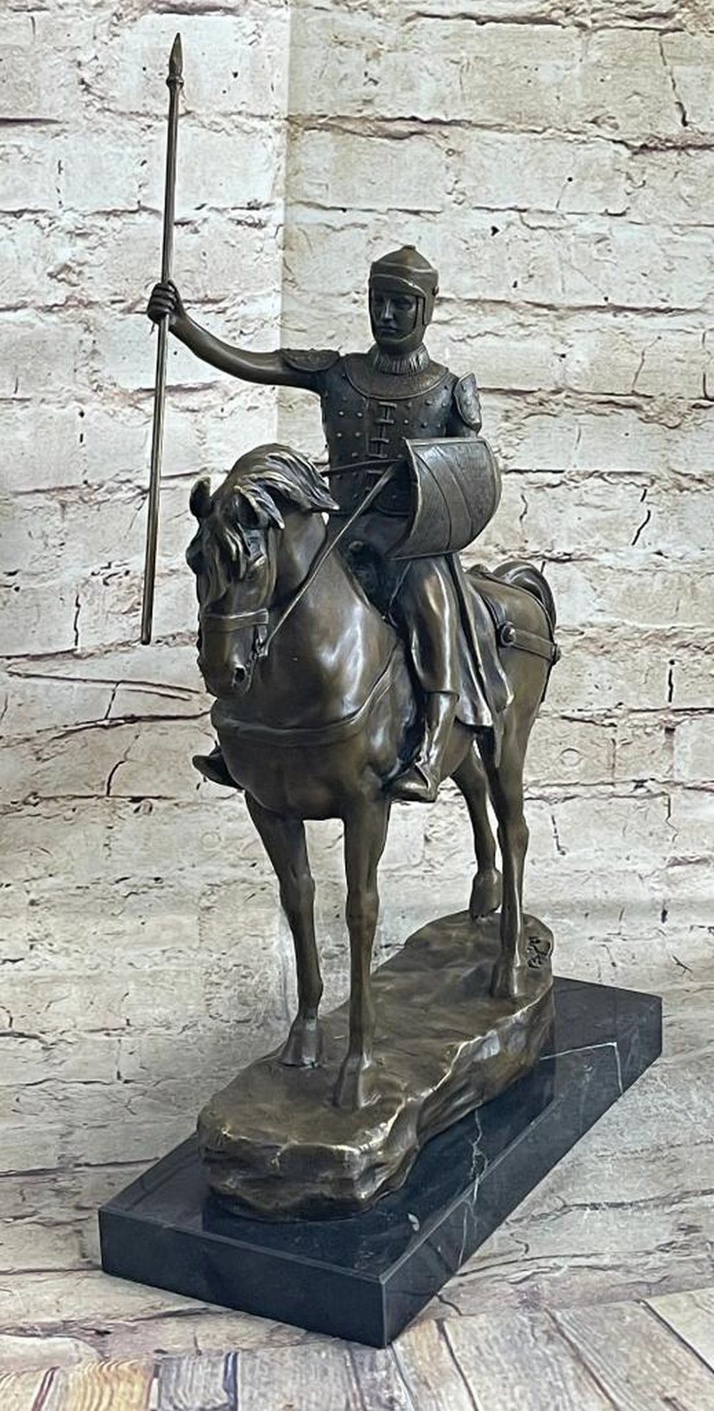 Bronze Medieval Knight on Armored Horse Sculpture by Reuper - 23" x 12": Bronze Medieval Knight on Armored Horse Sculpture by Reuper - 23" x 12" This intricately detailed bronze sculpture by Reuper captures the essence of a brave medieval knight. With a determined 