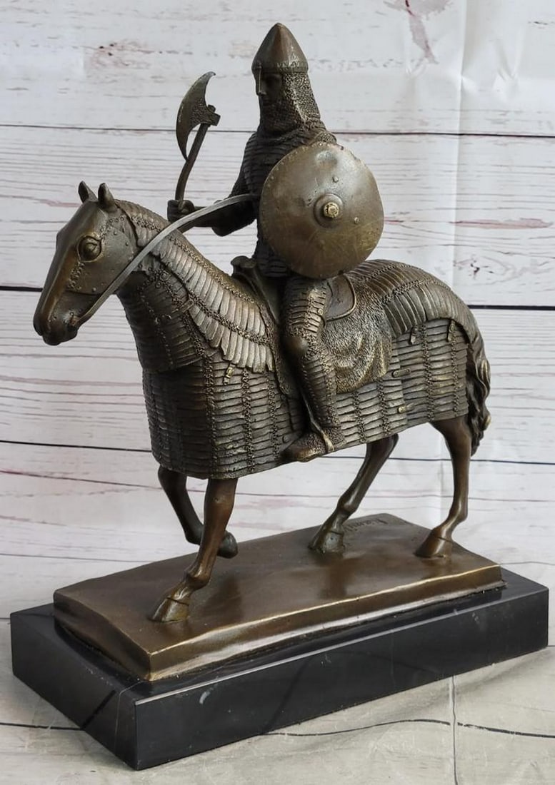 European Knight on Horse Back Inspired Bronze Statue - 12" x 10": European Knight on Horse Back Inspired Bronze Statue - 12" x 10" This sculpture masterfully depicts a resolute medieval knight, showcasing his unwavering bravery with a shield on one arm and a