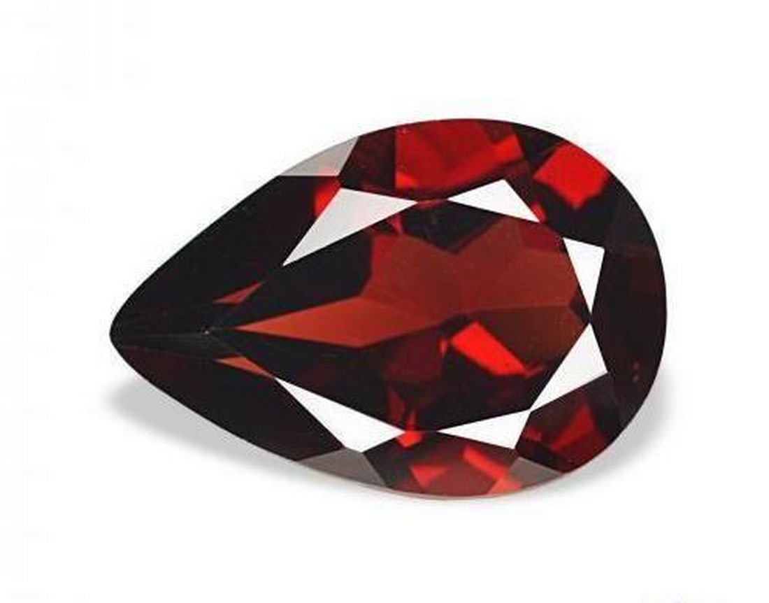 3.31ct Pear Cut Natural Deep Red Almandine Garnet Gemstone: 3.31ct Pear Cut Natural Deep Red Almandine Garnet Gemstone This 3.31ct natural almandine garnet from Mozambique features a rich deep red color and a classic pear cut with exceptional brilliance. With 