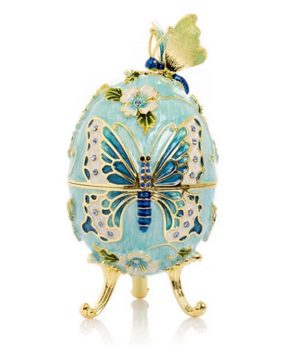 The Enchanted Bloom Egg Trinket Box: The Enchanted Bloom Egg Trinket Box This exquisite enamel-painted trinket box is a handcrafted masterpiece, adorned with handpicked Austrian crystals and finished in your choice of 24K gold or 925