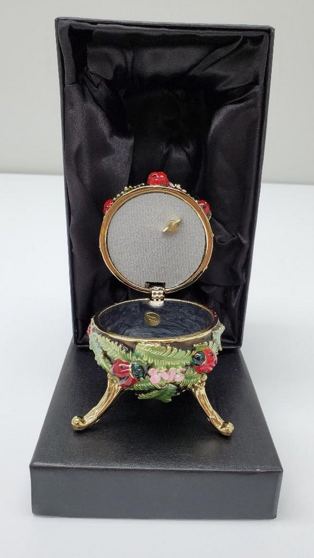 Enamel Painted Trinket Box Decorated with Austrian Crystals: Enamel Painted Trinket Box Decorated with Austrian Crystals A splendid handmade Green Faberge Egg with Ladybird Beetles Ladybugs Music Playing Trinket Box. This piece is a unique one of a kind piece m