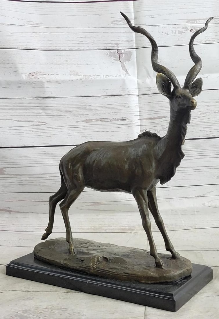 African Antelope Bronze Sculpture On Marble Base - 14" x 10.5": African Antelope Bronze Sculpture On Marble Base - 14" x 10.5" An absolute beautiful hand bronze sculpture depicting a splendid Elk and sculpted by the famous noted animalier ""Milo