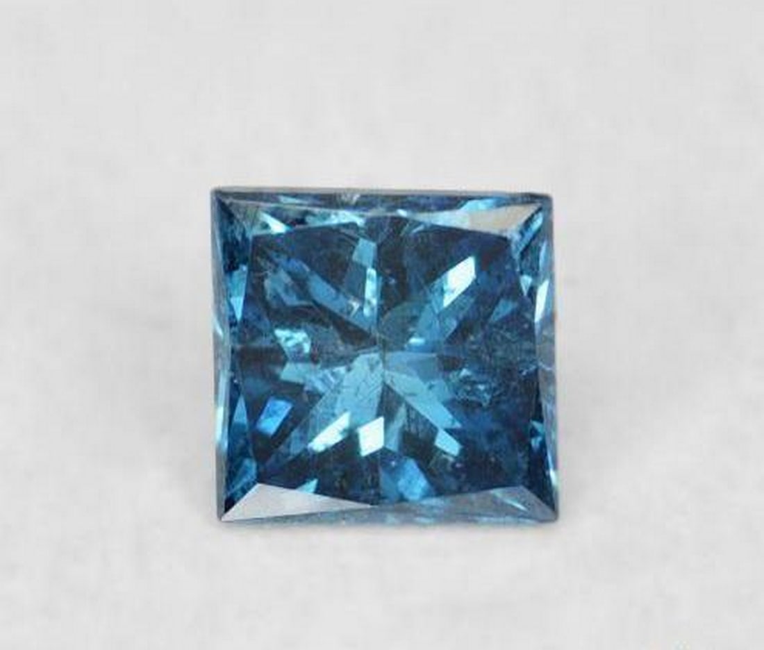 0.08ct Princess Cut Blue Diamond: 0.08ct Princess Cut Blue Diamond Specifications: Type: Diamond Weight: 0.08ct Size: 2.3 x 2.3mm Shape: Princess-Cut Color: Blue Clarity: VS Treat