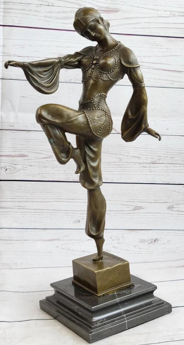 Antique Art Deco Bronze Sculpture: Signed Chiparus Dancer, Vintage Theatre and Opera Drama Influence: Emerging gracefully from behind a curtain, the Egyptian belly dancer delicately steps forward, her left leg kicked up, poised on tiptoes, and her head subtly cocked. She presents herself to the audien