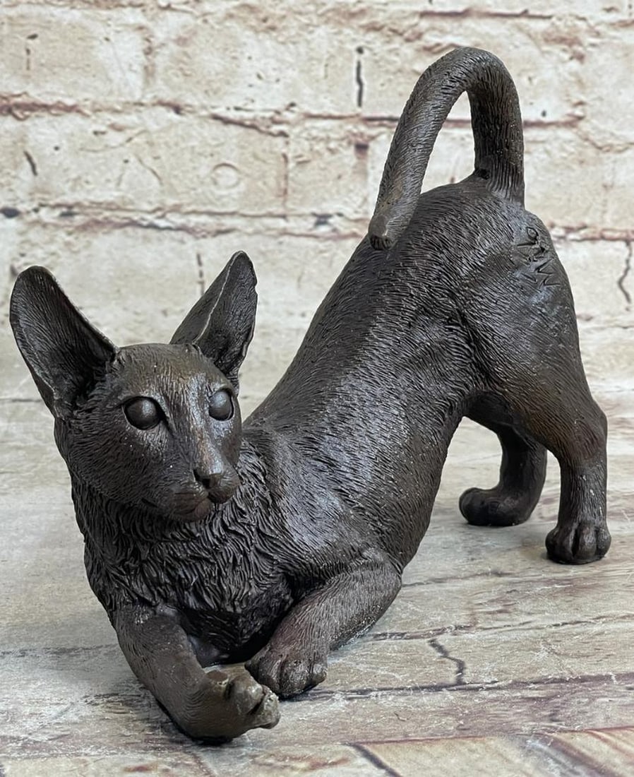 Playful Siamese Cat Inspired Bronze Statue - 6" x 9": Playful Siamese Cat Inspired Bronze Statue - 6" x 9" In the gentle morning light, the Siamese cat gracefully stretches, embodying the potential of a day ahead. Radiating feline elegance, it ga