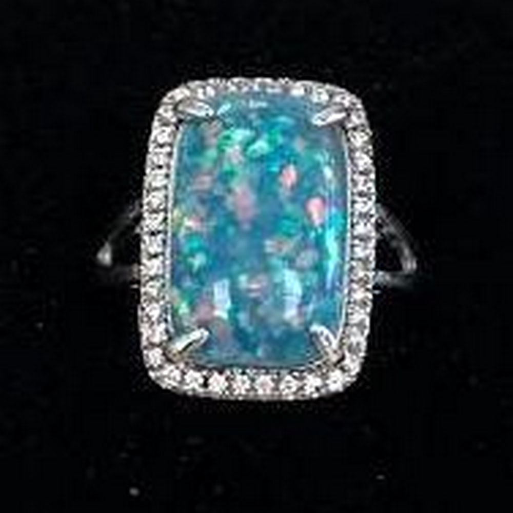 Silver-Colored Ring with Sparkling Blue Center (1 of 5)