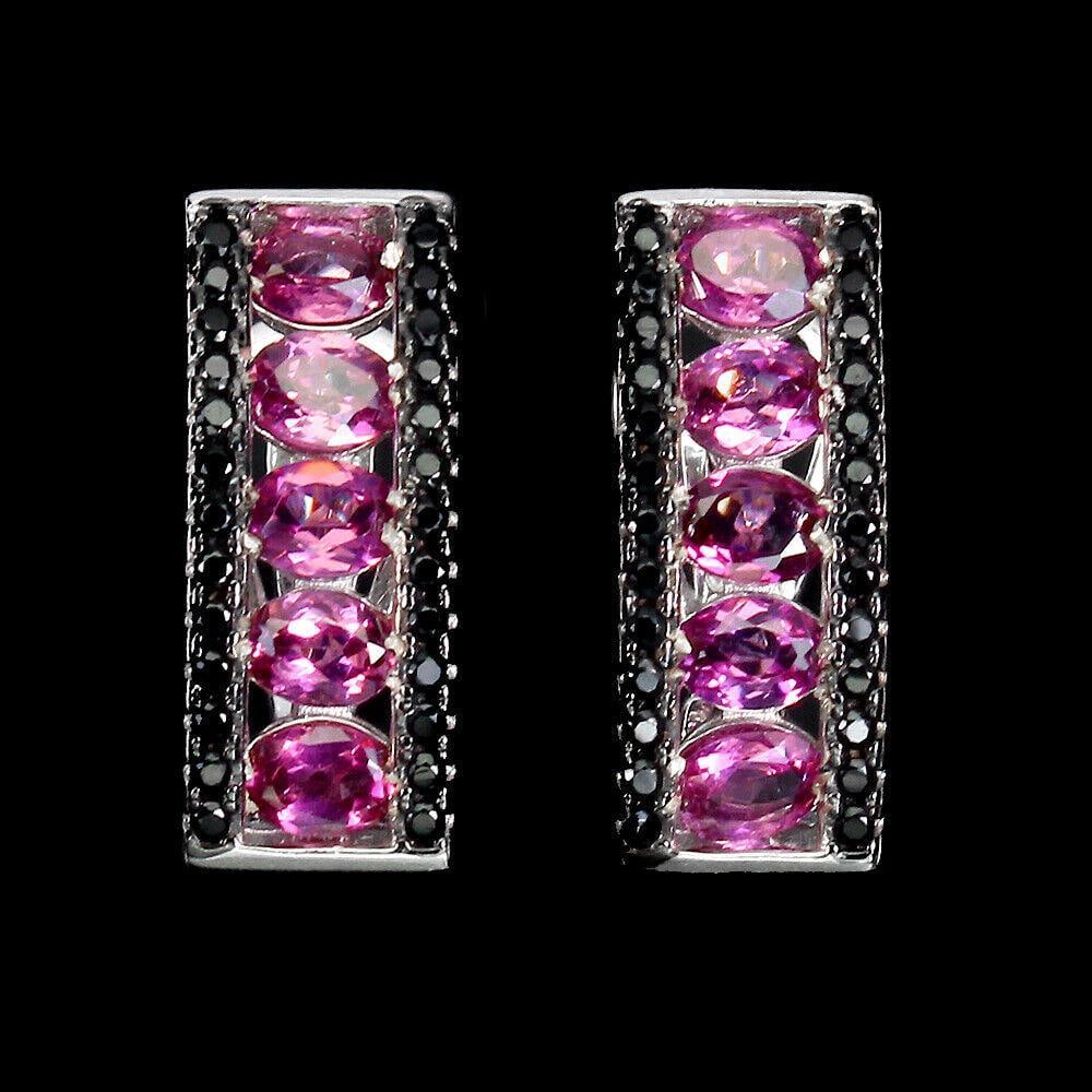 Oval Cut Rhodolite Garnet (4x3mm) & Black Spinel Crowned Sterling Silver Earrings: Oval Cut Rhodolite Garnet (4x3mm) & Black Spinel Crowned Sterling Silver Earrings Metal: 925 Sterling Silver Base Metal: Fine Silver Style: Stud Metal Purity: 925/1000 Plate: 2-Tone Black Rhodium 