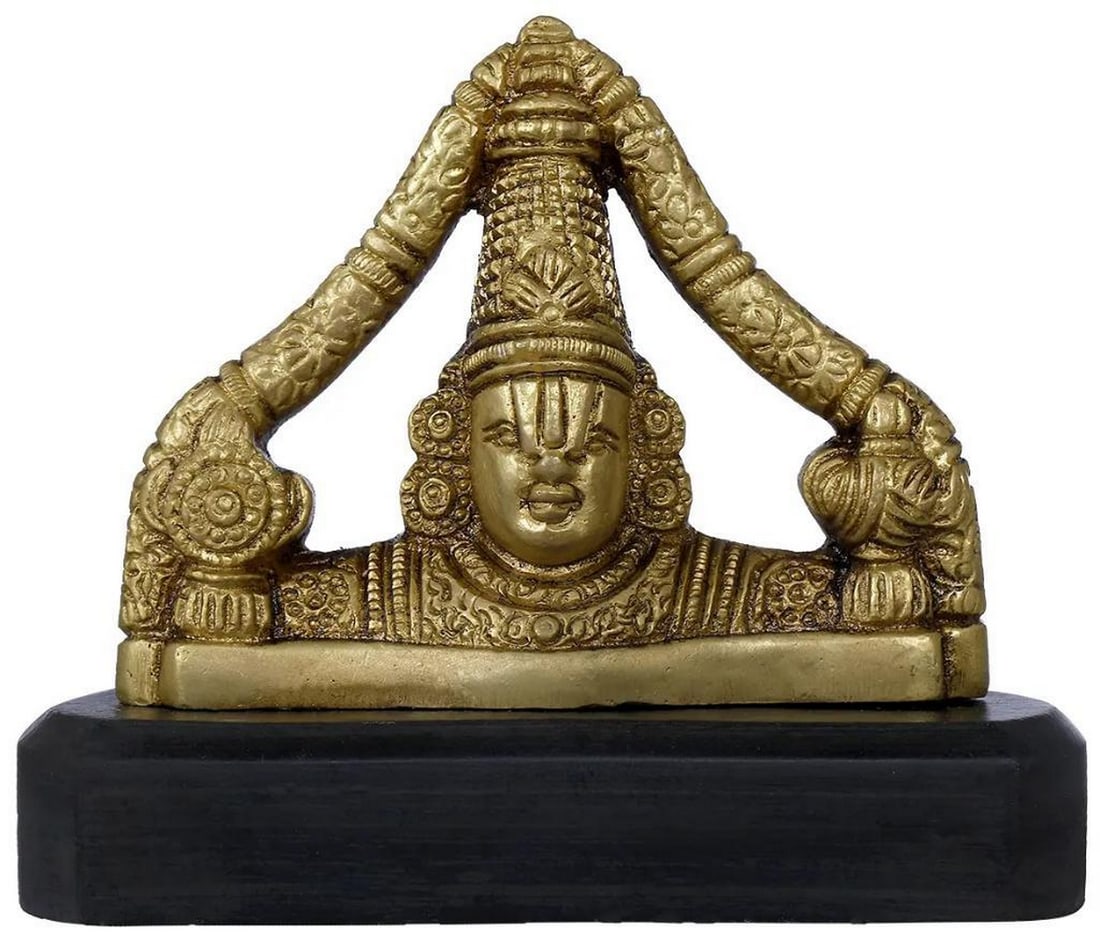 3" Handcrafted Brass and Wood Tirupati Balaji for Car Dashboard: 3" Handcrafted Brass and Wood Tirupati Balaji for Car Dashboard This finely handcrafted idol features Lord Tirupati Balaji in his iconic form, mounted on a wooden base for car dashboards. Cast in