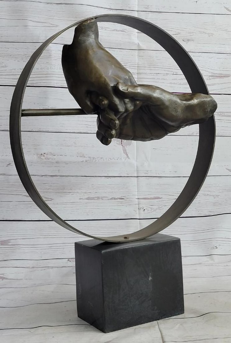 Lingering Handshake Bronze Sculpture: Lingering Handshake Bronze Sculpture This tender handshake bronze sculpture is the perfect elegant piece to add to your decor. This intriguing piece depicting two hands clinging together in a lingerin