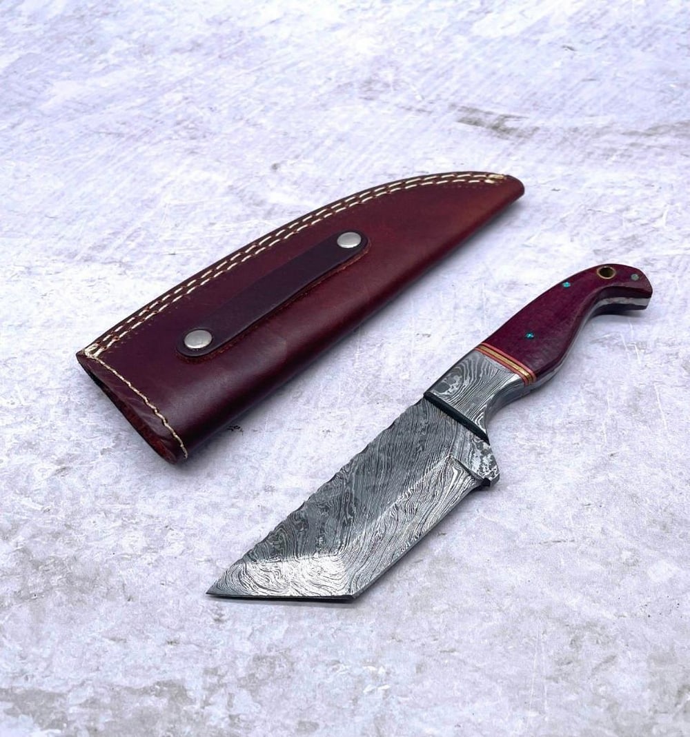 8" Straight Point Damascus Blade With Beautiful Rosewood Handle Laid With Bronze Rings: 8" Straight Point Damascus Blade With Beautiful Rosewood Handle Laid With Bronze Rings Damascus Steel Blade with 256 Layers on it. HARDNESS 56-60 H R C VERY HIGH QUALITY GENUINE LEATHER SHEATH