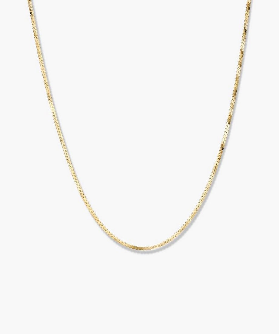 14k Yellow Gold Snake Chain Necklace: 14k Yellow Gold Snake Chain Necklace A sleek and minimal snake chain necklace in 14k yellow gold, designed to make a subtle yet powerful statement. Perfect for layering or wearing alone, it pairs