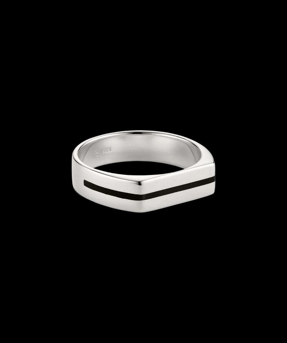 Sterling Silver Black Stripe Band Ring: Sterling Silver Black Stripe Band Ring Minimalism with magnitude. This slim sterling silver band features a bold black enamel stripe, offering sleek contrast without any excess. Hypoallergenic,