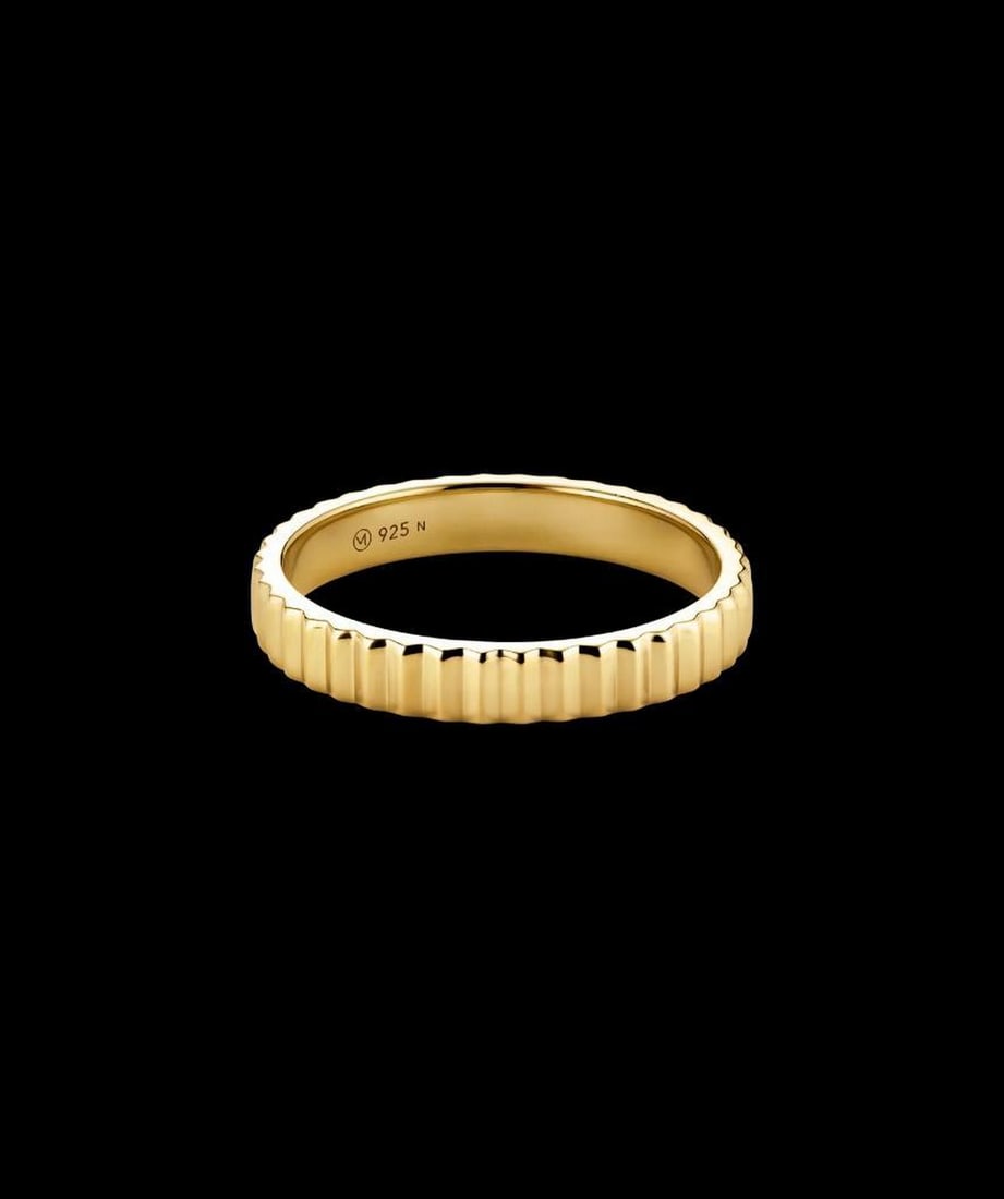 18k Gold Vermeil Fluted Eternity Ring: 18k Gold Vermeil Fluted Eternity Ring No beginning, no end—just golden perfection all the way around. The fluted texture catches light from every angle, adding depth and intricate detail.