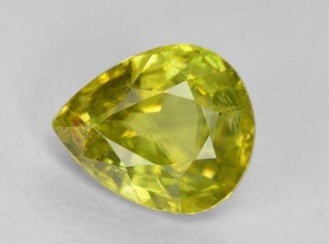 1.56 ct Natural Warm Forest Green Sphene, Pear Facet, VS-SI, Sri Lanka (1 of 3)
