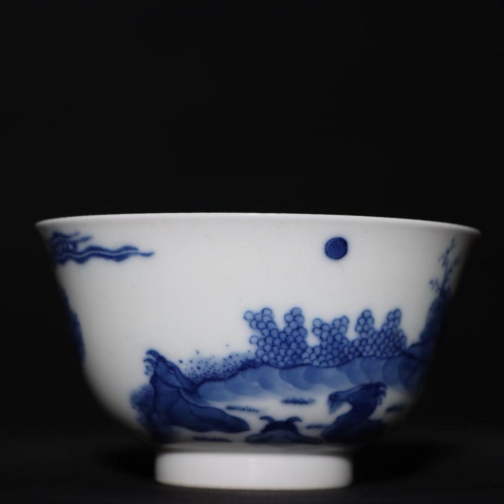 Qing Dynasty Kangxi Style Blue and White Character Cup: Qing Dynasty Kangxi Style Blue and White Character Cup. A finely crafted blue and white porcelain cup inspired by the Qing Dynasty Kangxi period, featuring intricate character scenes rendered in delic