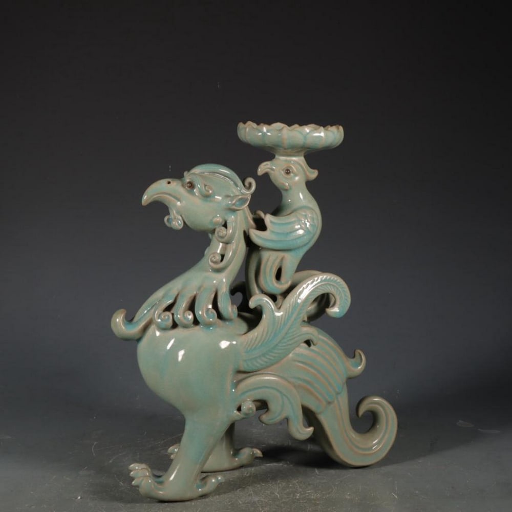Old Song Ru Kiln Azure Glazed Phoenix Sculptures: Old Song Ru Kiln Azure Glazed Phoenix Sculptures A magnificent pair of phoenix sculptures inspired by the style of the Song dynasty’s renowned Ru kiln, finished with a luminous azure glaze. Each fig