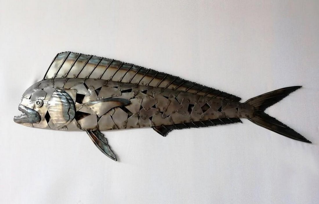 Dolphin Fish Metal Wall Sculpture: Dolphin Fish Metal Wall Sculpture This exquisite Dolphin Fish Sculpture brings the elegance of the ocean to your space. Meticulously handcrafted from metal, this 3D sculpture captures the grace of a d