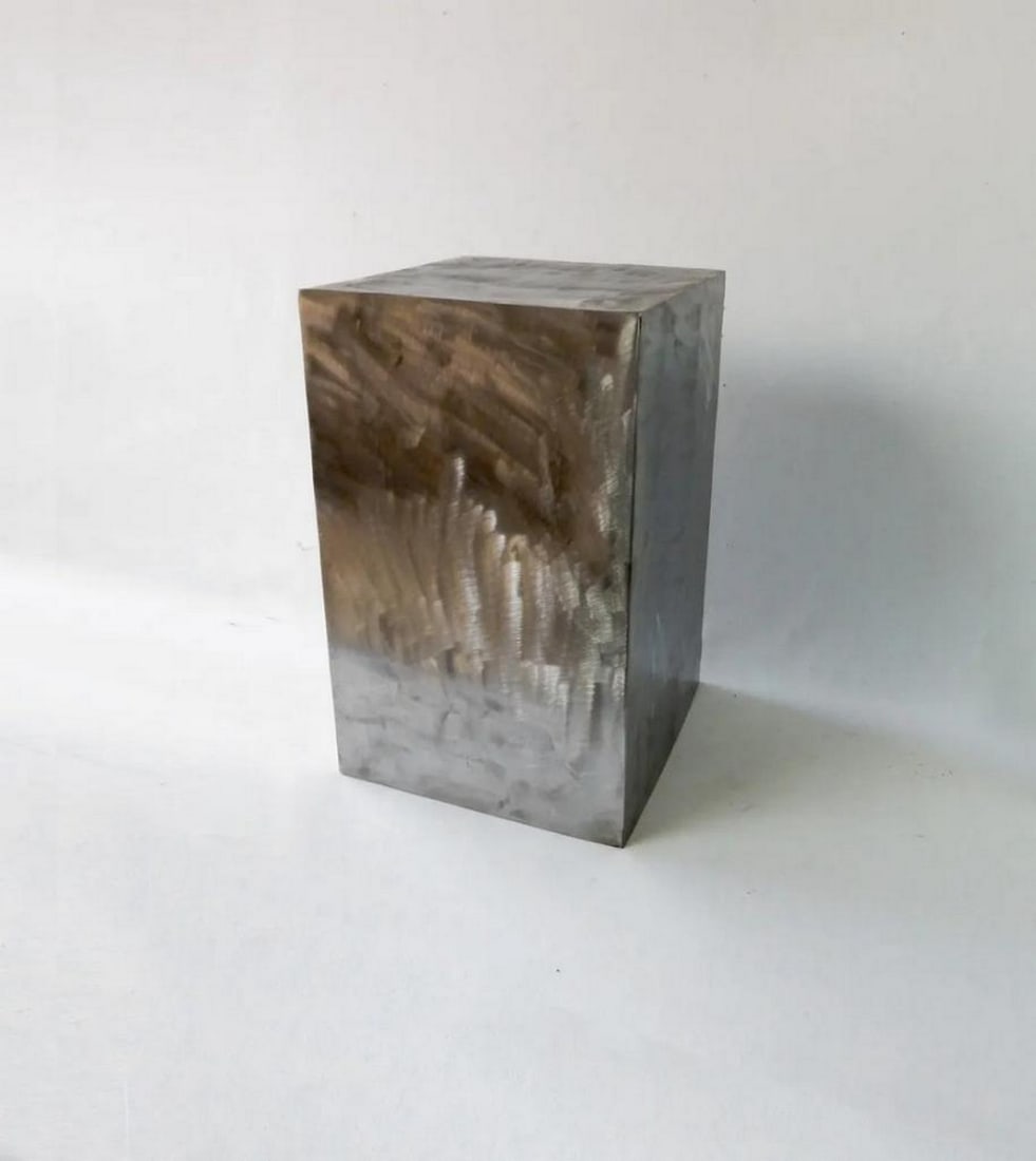 Handcrafted Polished Metal Pedestal: Handcrafted Polished Metal Pedestal This handcrafted polished metal pedestal is meticulously designed with precision and durability in mind. Each piece is cut, bent, and welded by hand, ensuring excep