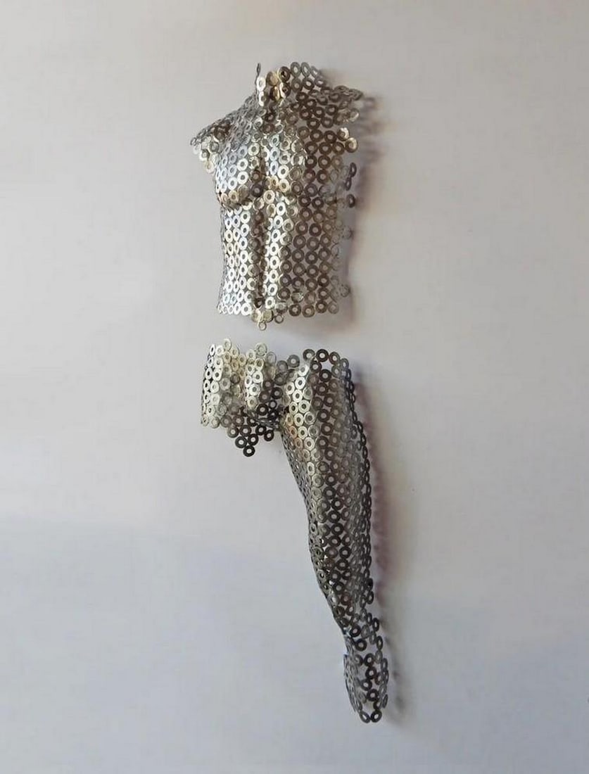 Life-Size Metal Torso Sculpture: Life-Size Metal Torso Sculpture This stunning Life-Size Metal Torso Sculpture blends intricate craftsmanship with abstract art. Meticulously crafted from individually welded round pieces of metal, the