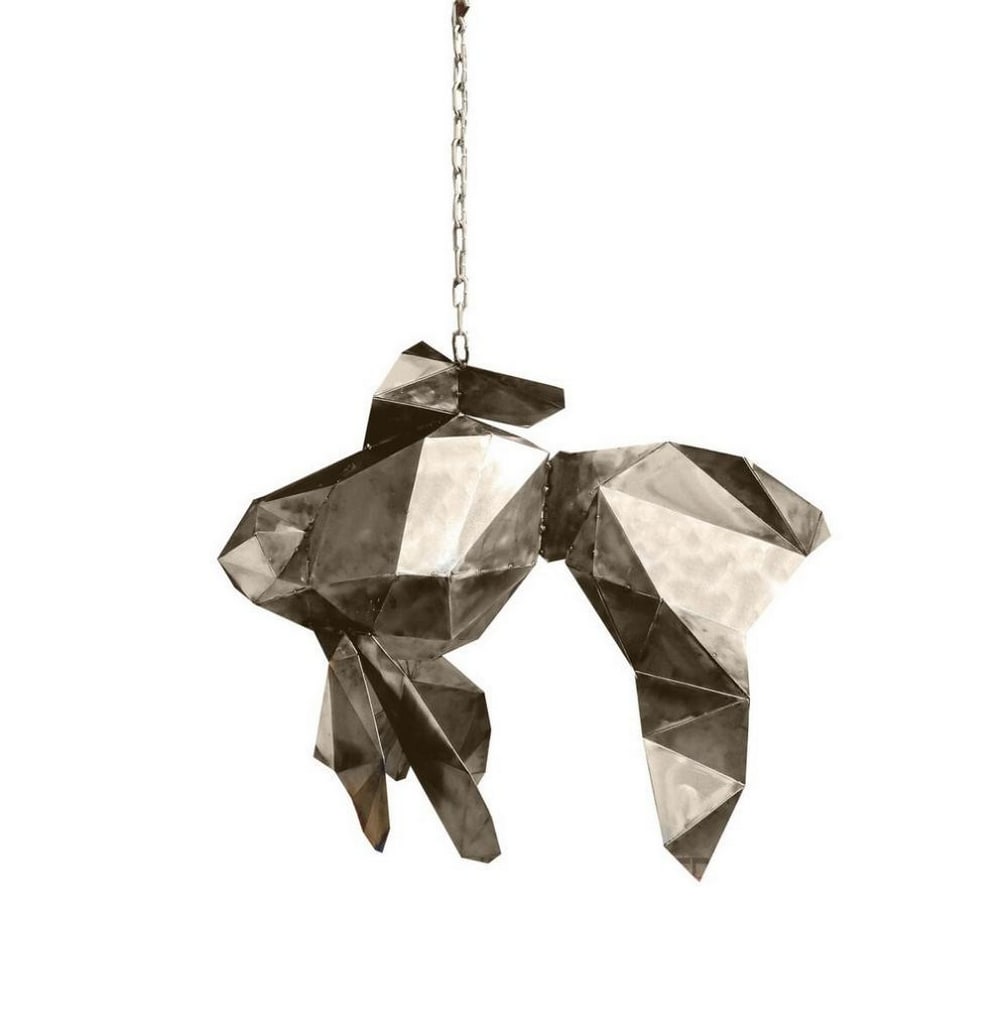 Japanese Fish Metal Sculpture Lamp: Japanese Fish Metal Sculpture Lamp This handcrafted metal sculpture depicts a Japanese fish, designed with elegant, flowing lines and a dynamic form. Formed and welded by hand from metal sheets, the p