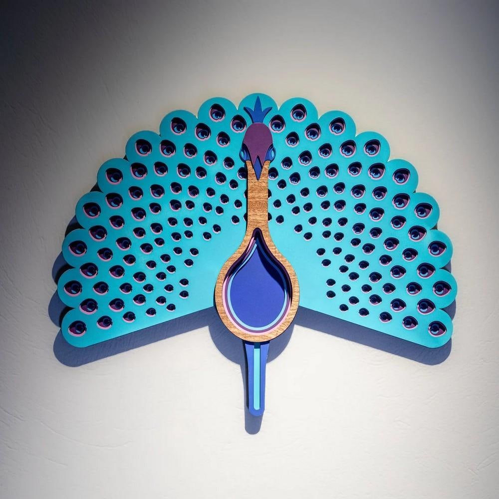 Majestic Peafowl Hand-Carved Wooden Mask: Majestic Peafowl Hand-Carved Wooden Mask Celebrate the elegance of nature with this handcrafted peafowl wooden wall mask. Inspired by the beauty of the majestic peacock, this striking piece showcases 