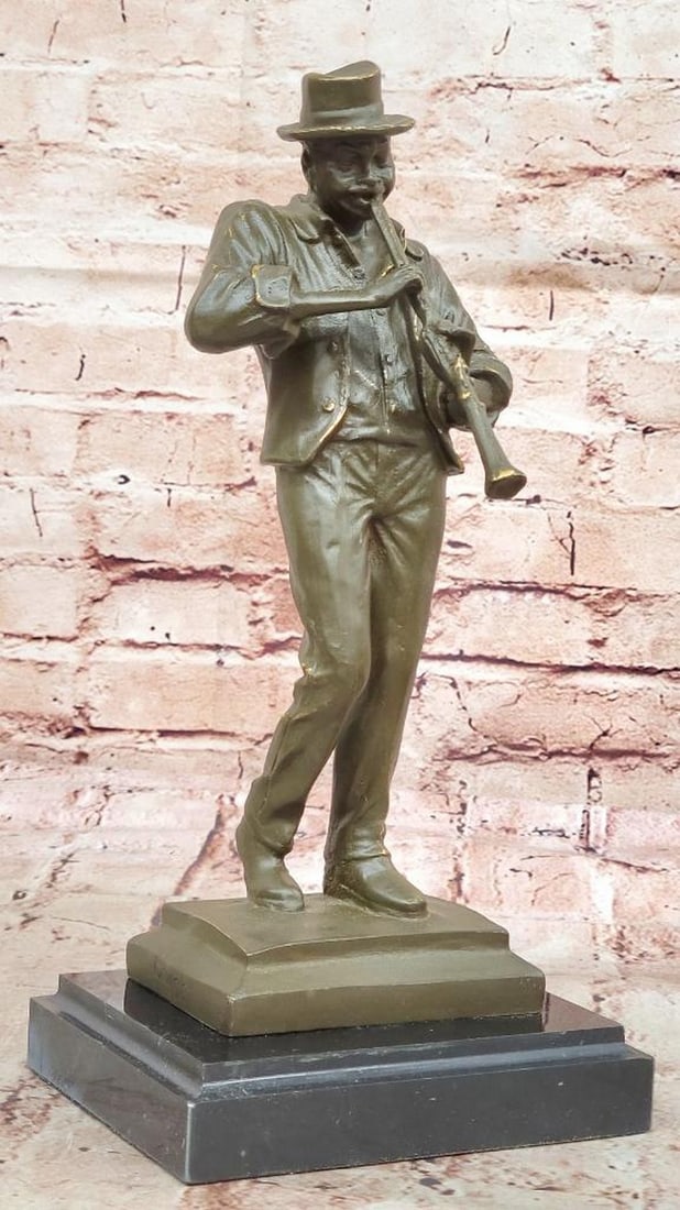 Soulful Serenade: Bronze Sculpture of a Black American Clarinetist: Soulful Serenade: Bronze Sculpture of a Black American Clarinetist This handmade bronze sculpture, Soulful Serenade, powerfully captures the deep emotional energy of a Black American musician immersed