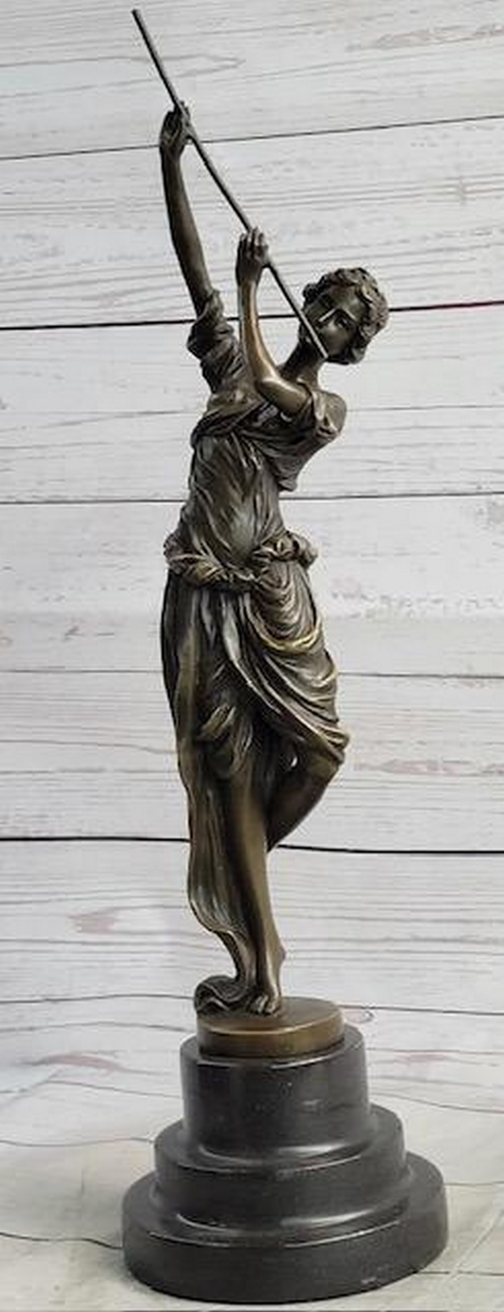 Enchanting Melodies - Original Bronze Sculpture of a Flute-Playing Maiden by Colinet - 18" x 6": Enchanting Melodies - Original Bronze Sculpture of a Flute-Playing Maiden by Colinet - 18" x 6" Elevate the ambiance of your space with the captivating bronze sculpture titled "Enchanting 