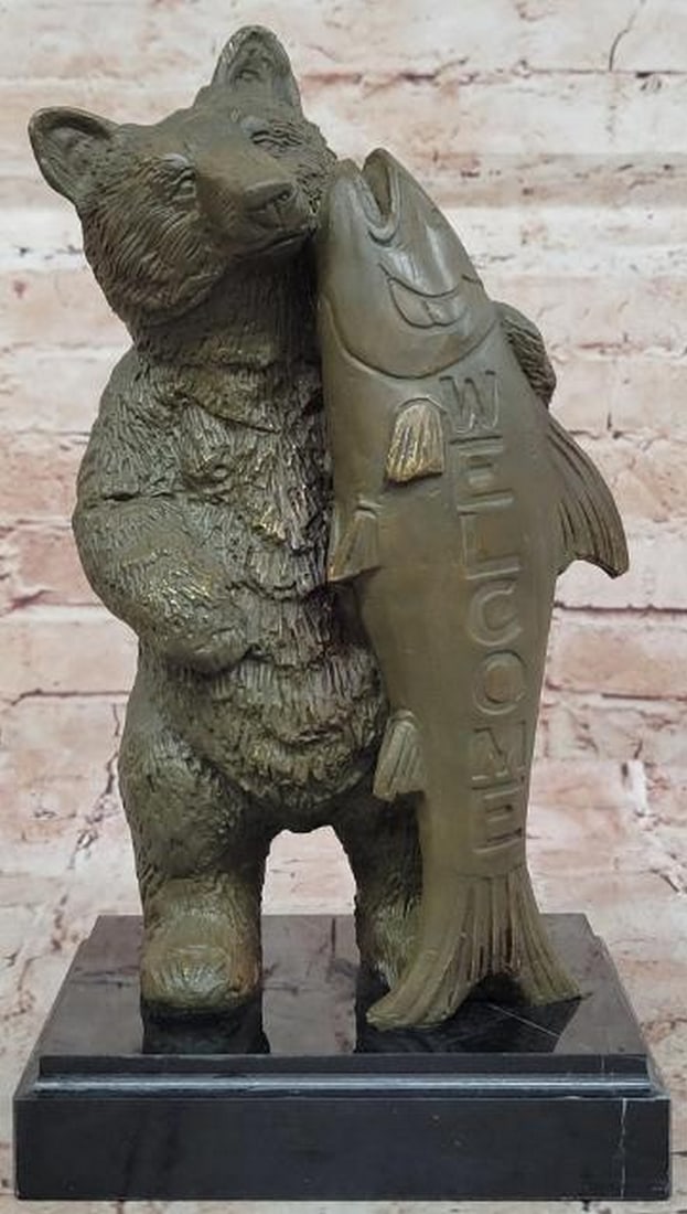 Bronze Bear Welcome Statue: Bronze Bear Welcome Statue This delightful Bronze Bear Welcome Statue, inspired by the artistry of M. Lopez, brings a warm and playful touch to any home or garden. The statue features a majestic bear 