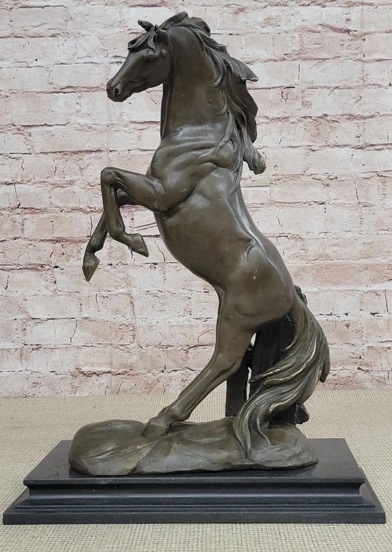 Majestic Rearing Horse Bronze Sculpture by M. Lopez - 16" x 11": Majestic Rearing Horse Bronze Sculpture by M. Lopez - 16" x 11" This exquisite bronze sculpture captures the raw energy and untamed spirit of a rearing horse, its powerful stance radiating