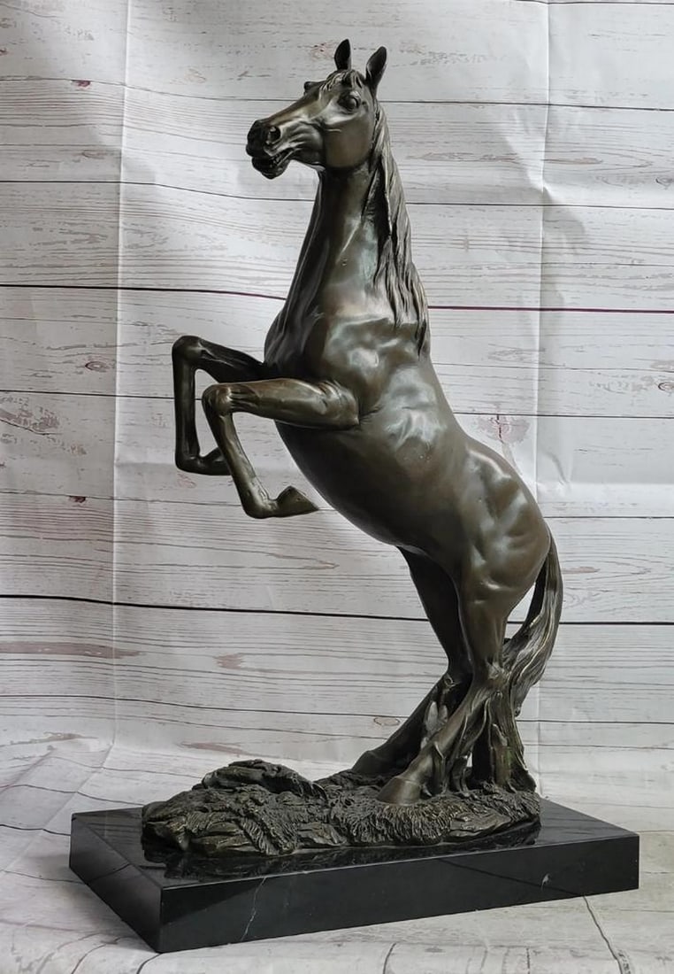 Rearing Stallion Bronze Sculpture by Milo - 22" x 16": Rearing Stallion Bronze Sculpture by Milo - 22" x 16" This striking bronze sculpture captures the raw energy and untamed spirit of a majestic stallion rearing on its powerful hind legs. With