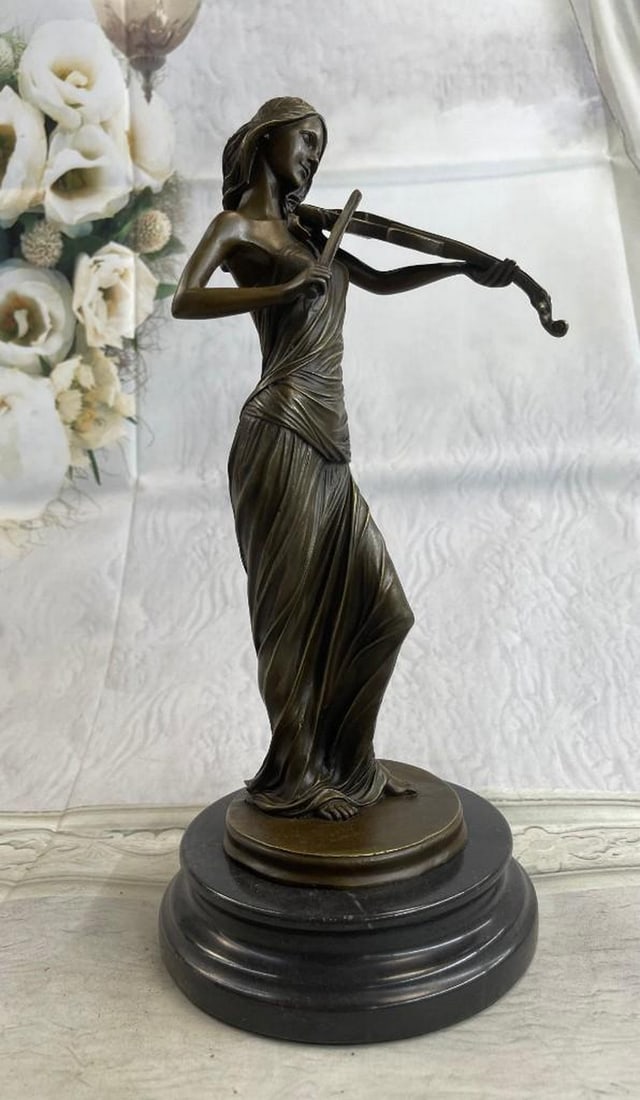 Female Violinist Bronze Statue (Brown Patina Colouring): Female Violinist Bronze Statue (Brown Patina Colouring). Peacefully entranced by her musical gift, this woman plays her violin. Her eyes are closed as she moves the bow back and forth creating beautif
