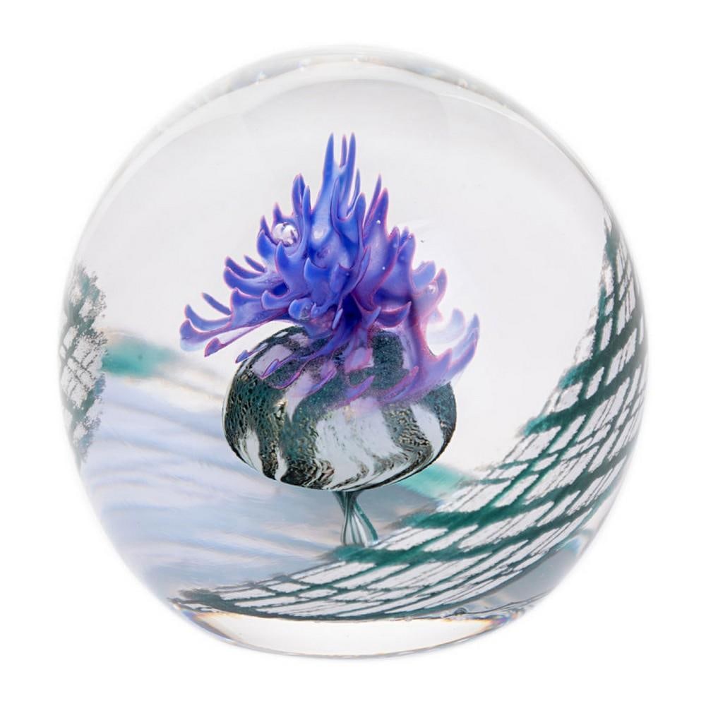 Scottish Thistle Paperweight: Scottish Thistle Paperweight A handcrafted glass paperweight featuring a central thistle surrounded by swirling tartan patterns, capturing Scottish charm in a unique design. Perfect as a decorative