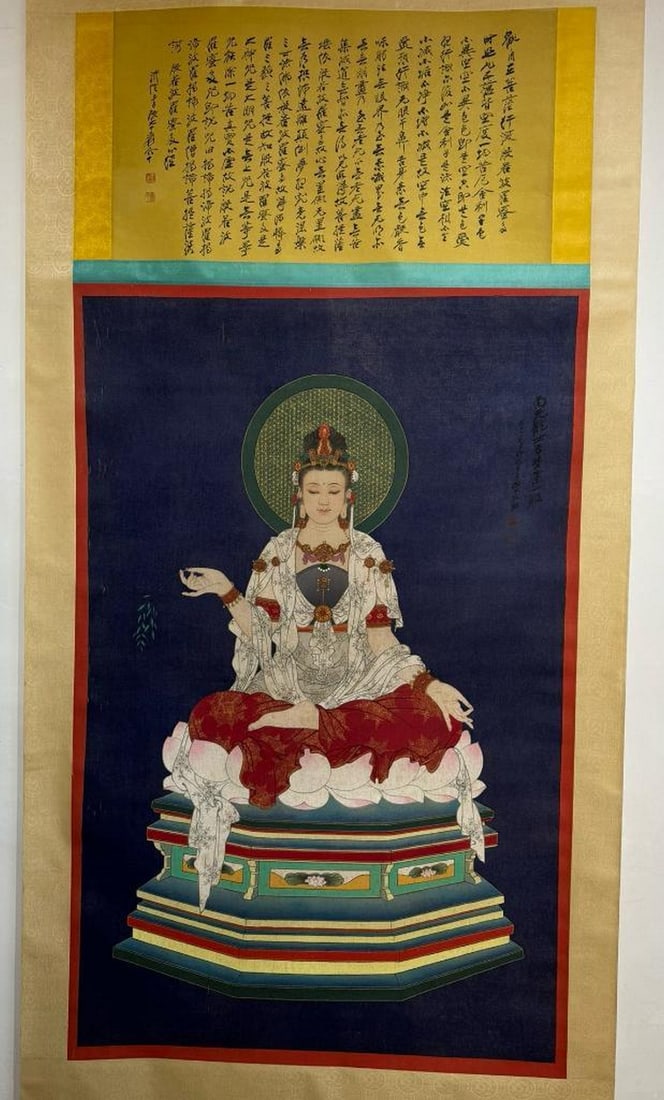 Guanyin Bodhisattva Inspired Silk Scroll: Guanyin Bodhisattva Inspired Silk Scroll A captivating silk scroll inspired by Zhang Daqian, featuring the serene Guanyin Bodhisattva. The delicate brushwork and graceful depiction of the figure