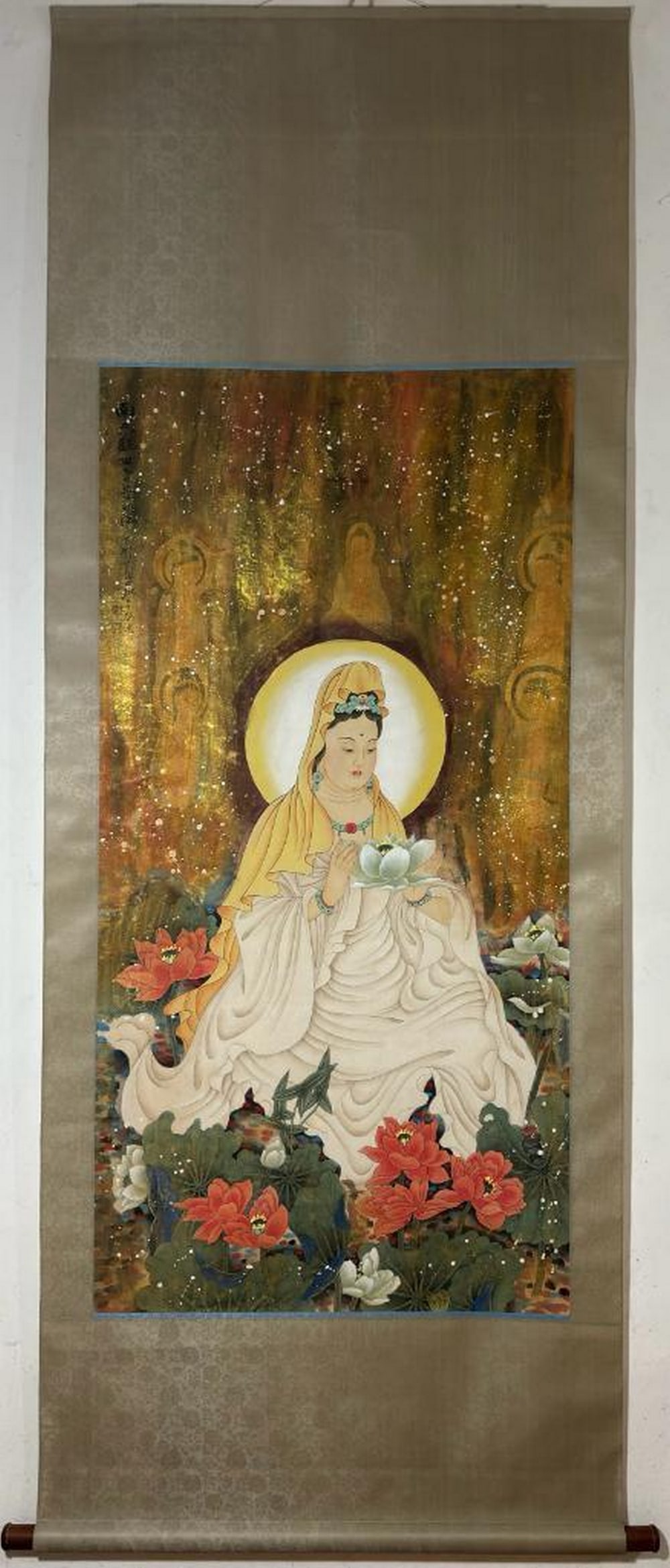 Seated Guanyin in Meditation Inspired Scroll Painting: Seated Guanyin in Meditation Inspired Scroll Painting In this serene and contemplative scroll painting inspired by Zhang Daqian, Guanyin, the Bodhisattva of Mercy, is depicted seated in quiet